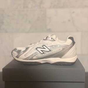 New Balance Kids' White & Silver Athletic Sneaker